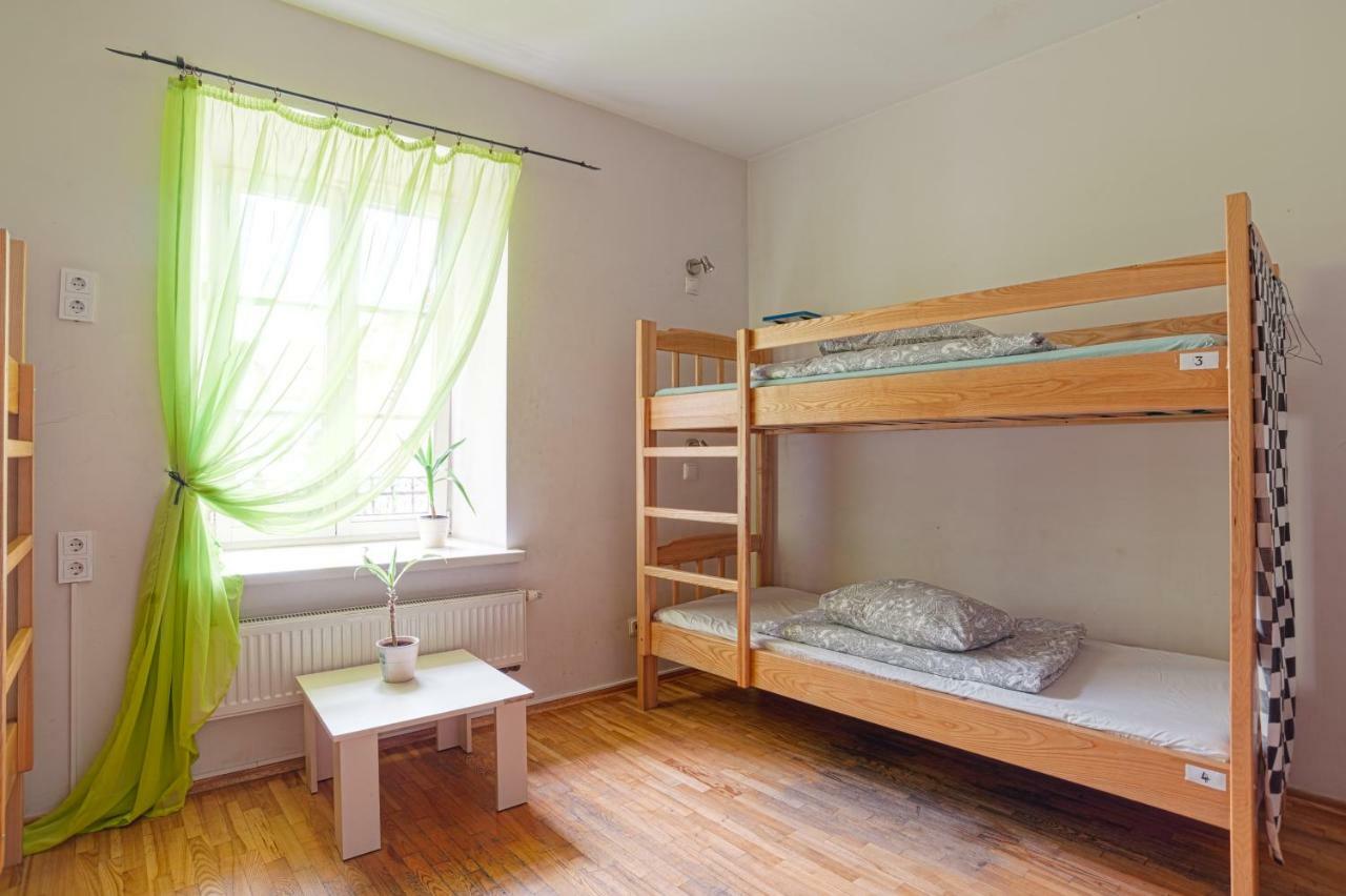 Pogo Hostel VNO Esterno foto A typical hostel room